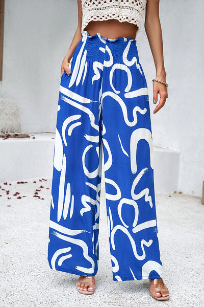 Printed wide-leg pants with smock and pockets