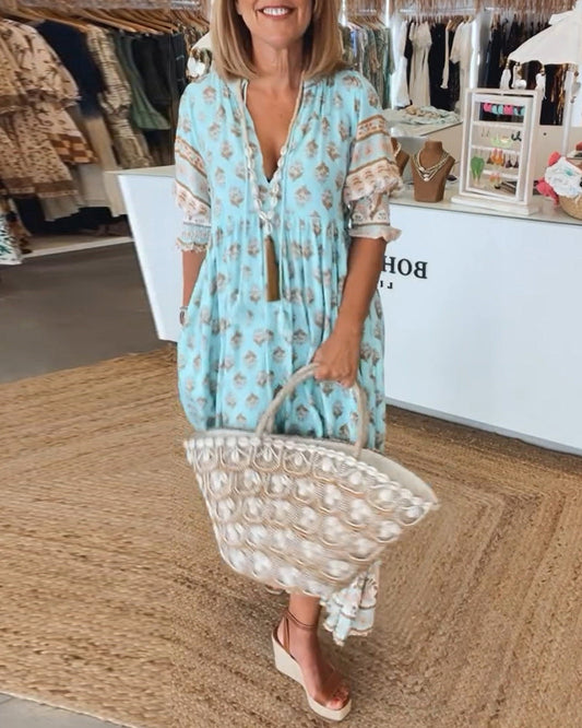 PRINTED DRESS WITH V-NECK AND HALF-SLEEVES