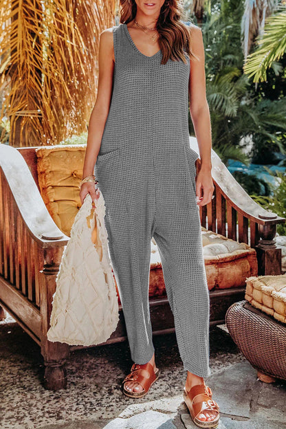 Casual solid color V-neck pocket jumpsuits with loose fit