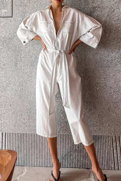 Casual monochrome jumpsuits with lace and gathered collar falling loosely down