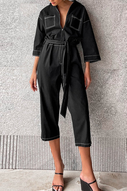 Casual monochrome jumpsuits with lace and gathered collar falling loosely down