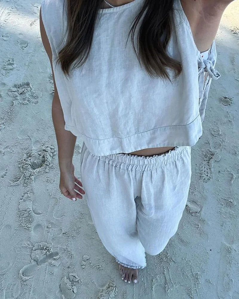 Two-piece set consisting of vest and pants with lacing