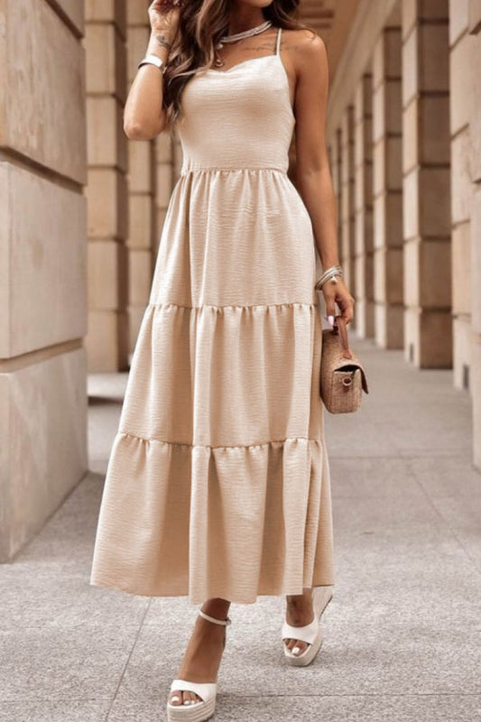 LP | Multi-layered dress with crossed straps.