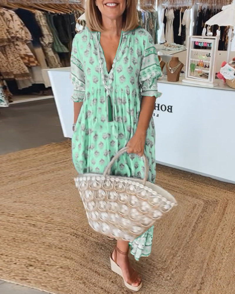 PRINTED DRESS WITH V-NECK AND HALF-SLEEVES