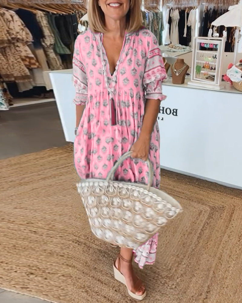 PRINTED DRESS WITH V-NECK AND HALF-SLEEVES
