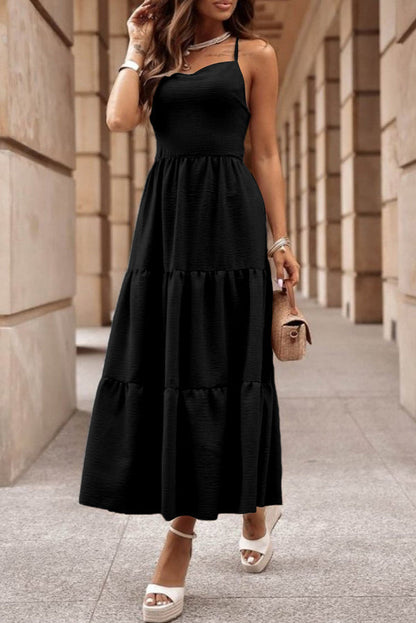 LP | Multi-layered dress with crossed straps.