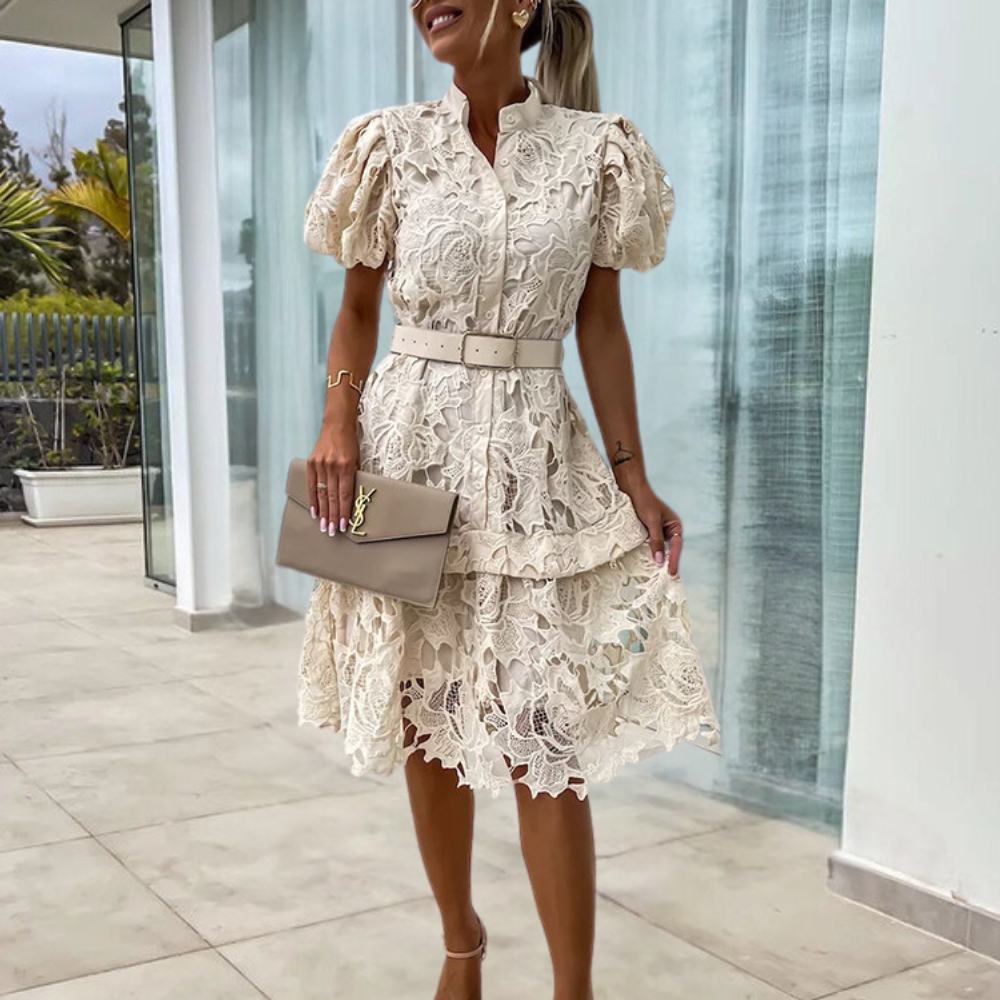 LP | Women's lace dress with puff sleeves and belt.