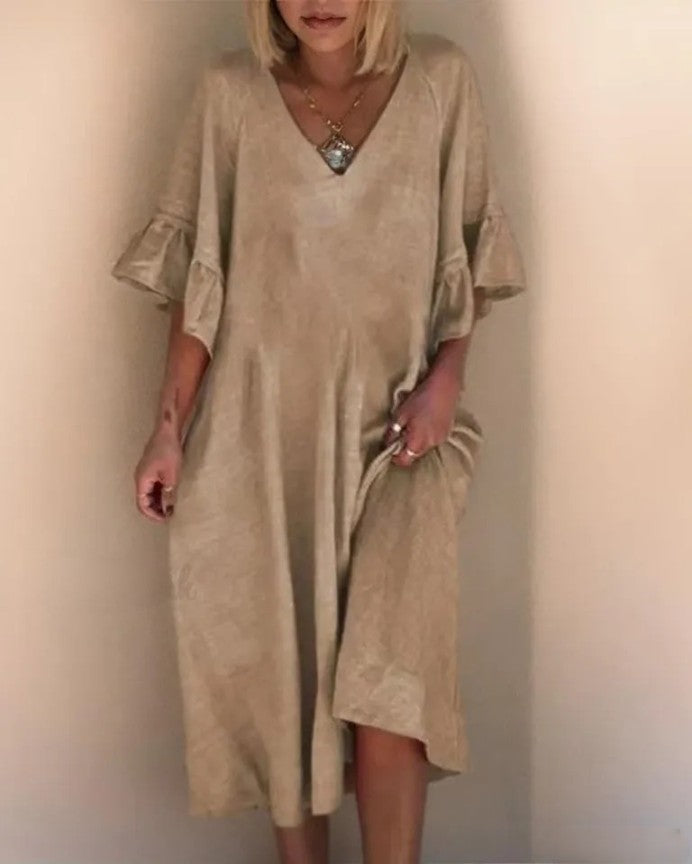 LP | Sleek, loose-fitting dress with plain V-neckline