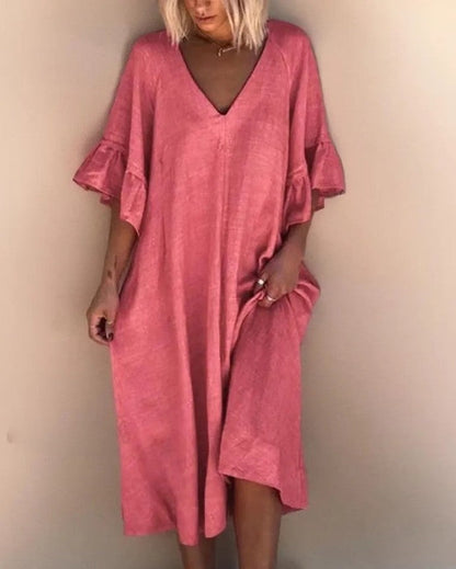 LP | Sleek, loose-fitting dress with plain V-neckline