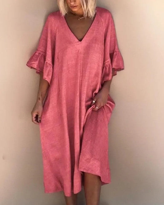 LP | Sleek, loose-fitting dress with plain V-neckline