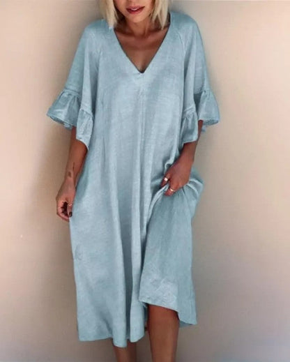 LP | Sleek, loose-fitting dress with plain V-neckline