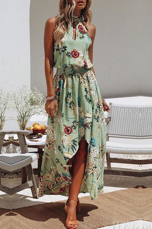 LP | Green dress with round neckline and floral print.