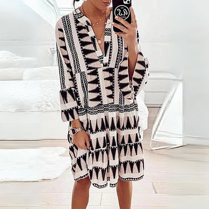 LP | Dress with animal print and puff sleeves