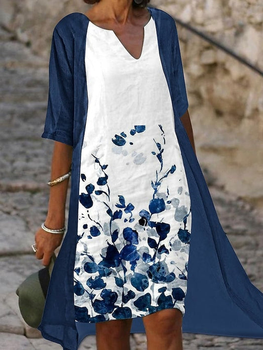 LP | Two-piece midi dress with blue floral print and elegant half sleeves