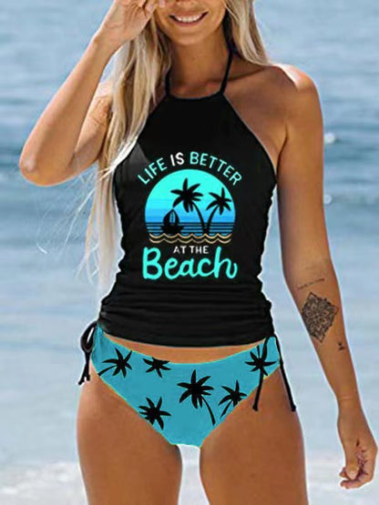 Stylish black halterneck swimsuit with print