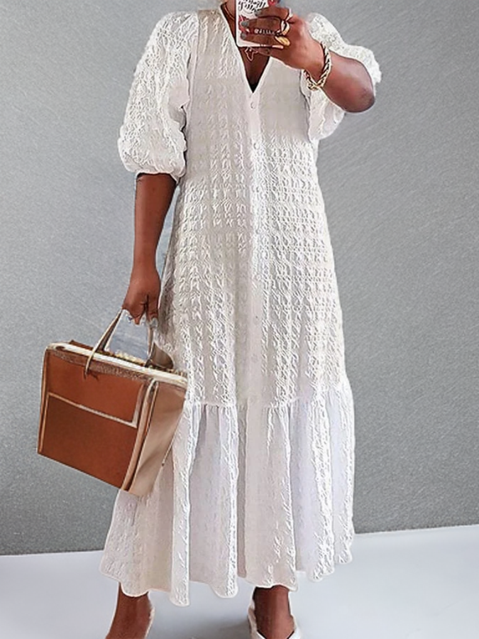 LP | Casual dress with pleated buttons.