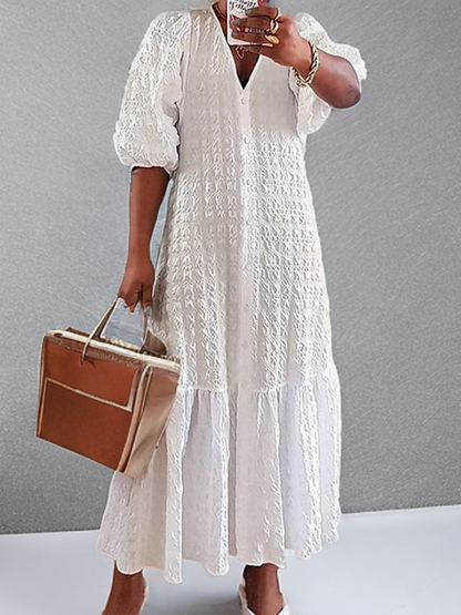 LP | Casual dress with pleated buttons.