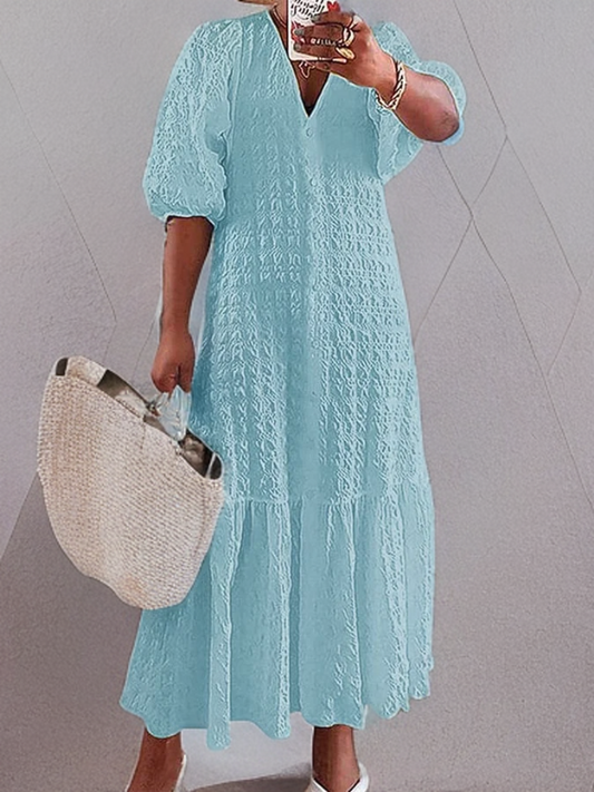 LP | Casual dress with pleated buttons.