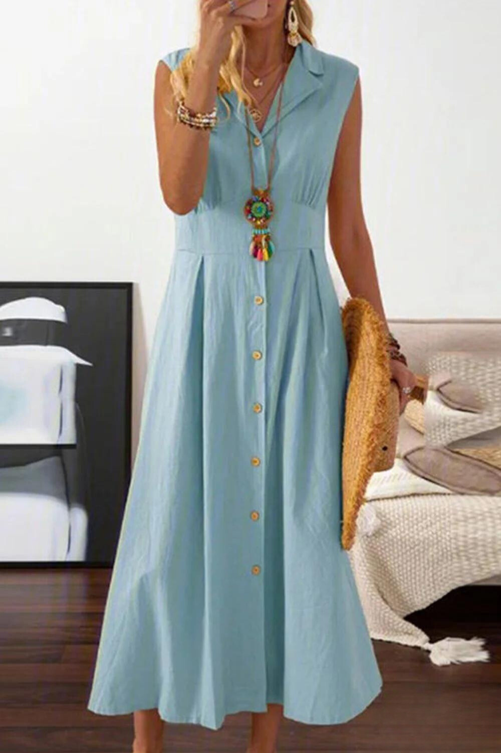 LP | sleeveless midi dress with overlapping buttons.