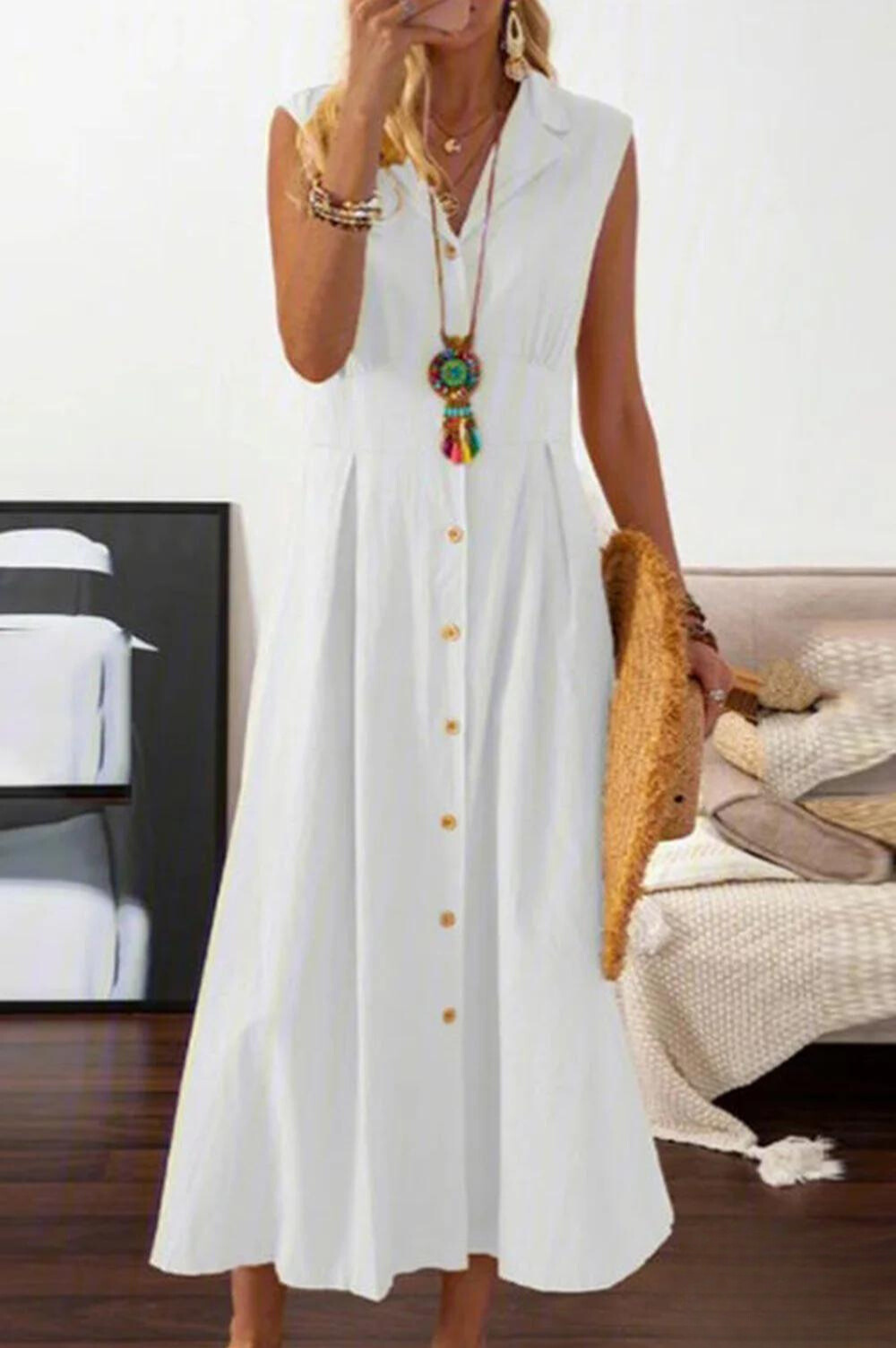 LP | sleeveless midi dress with overlapping buttons.