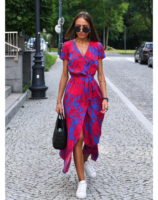Floral dress with high slit and adjustable waist.
