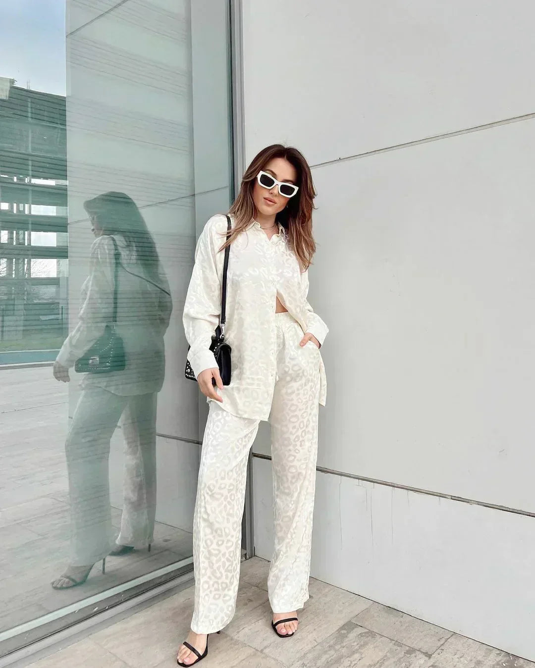 Elegant button-down blouse and wide-leg pants