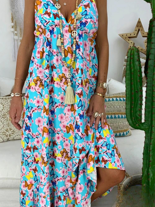 LD Long printed dress with spaghetti straps and V-neckline