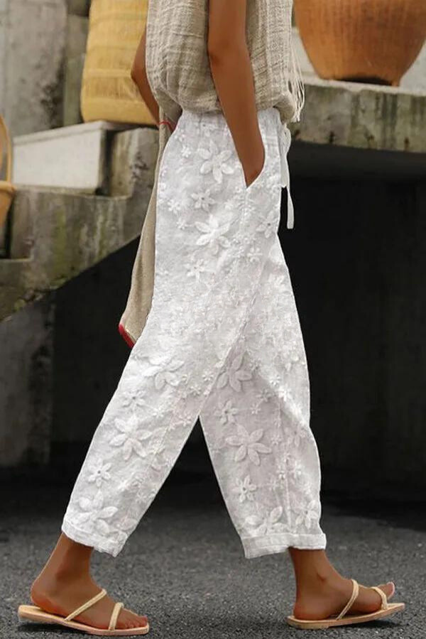 Pants with patchwork floral pattern, pocket and elastic waistband