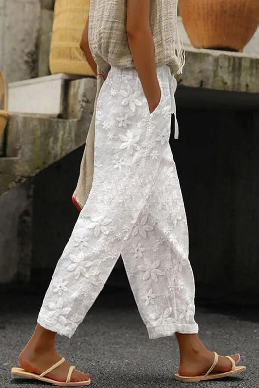 Pants with patchwork floral pattern, pocket and elastic waistband
