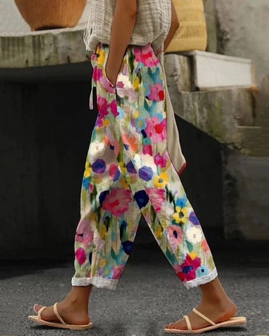 Sweatpants with pockets and colorful floral print
