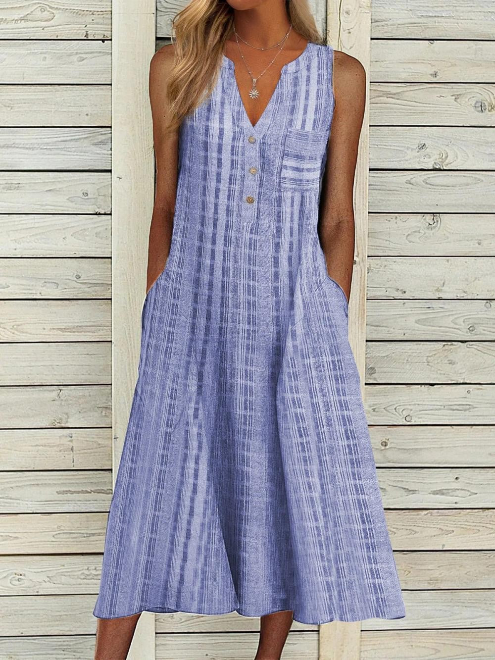 LP | Simple, sleeveless dresses with plunging neckline.