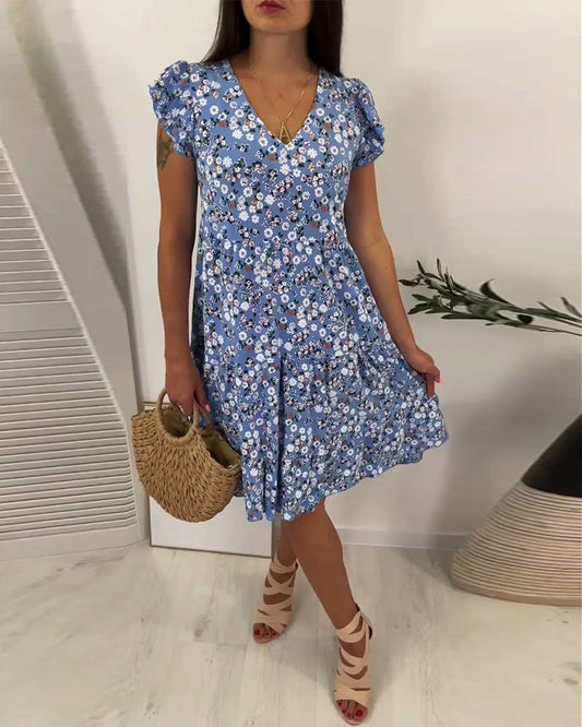 Midi dress with V-neck and floral pattern without sleeves