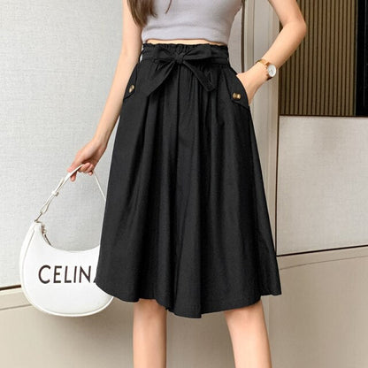 Thalassa - High-waisted pants draped from a mid-calf skirt