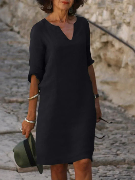 V-neck dress that covers the belly.